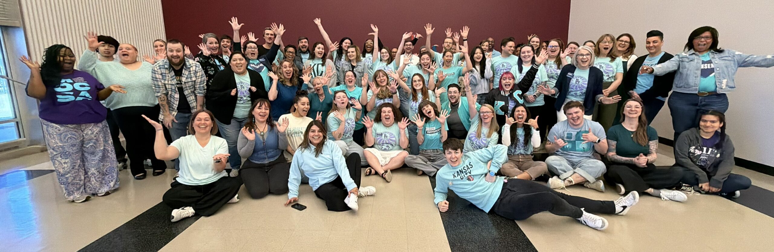 MOCSA staff wearing various shades of teal